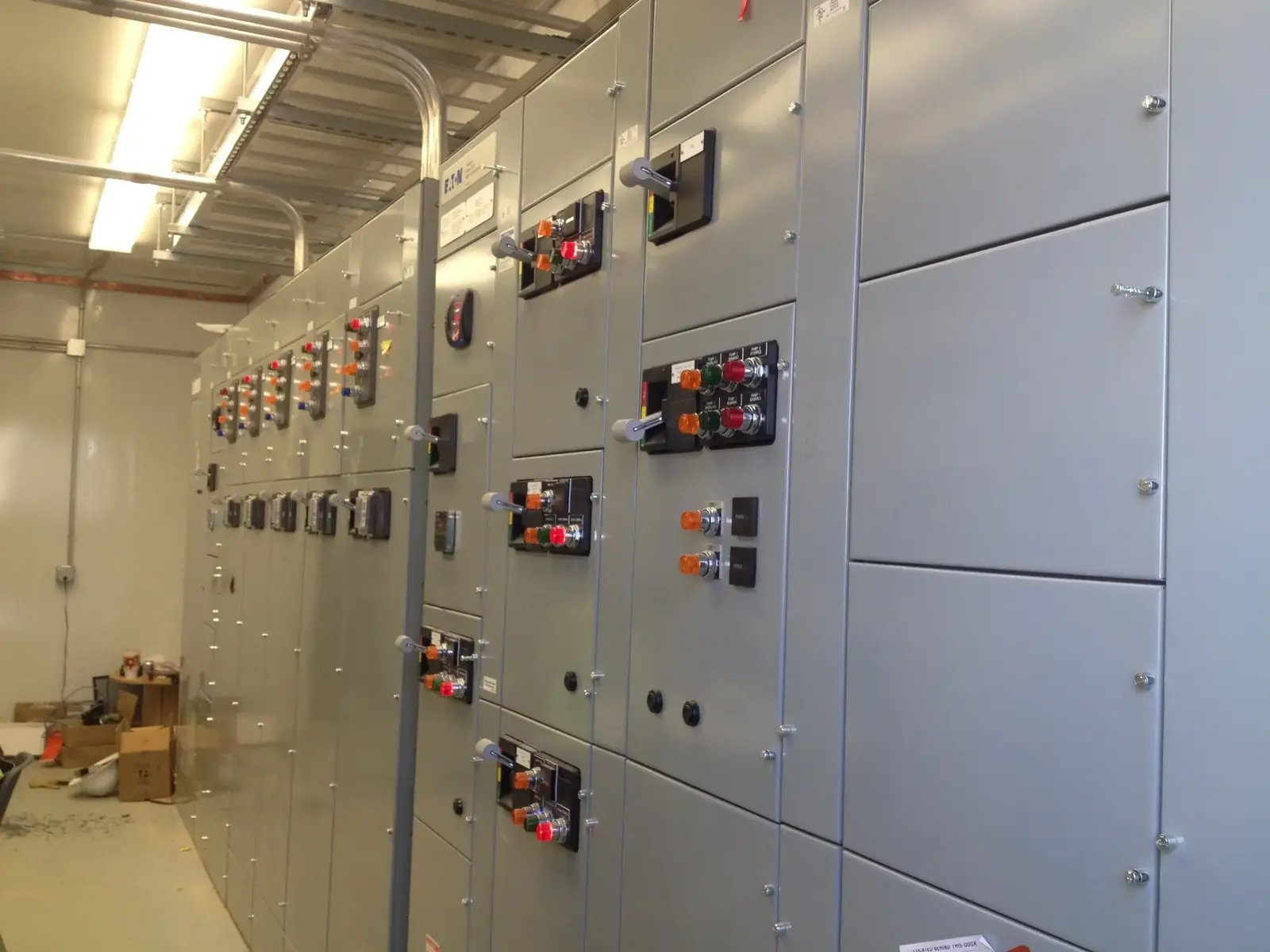 Row of commercial switchgear and power distribution cabinets